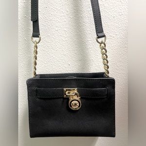 Black leather with gold hardware shoulder/ crossbody bag